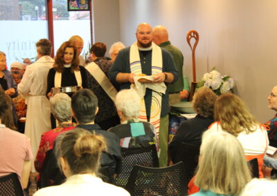 Clergy member preaching to the congregation