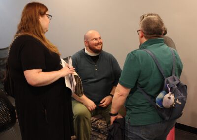Guests chatting together at the reception