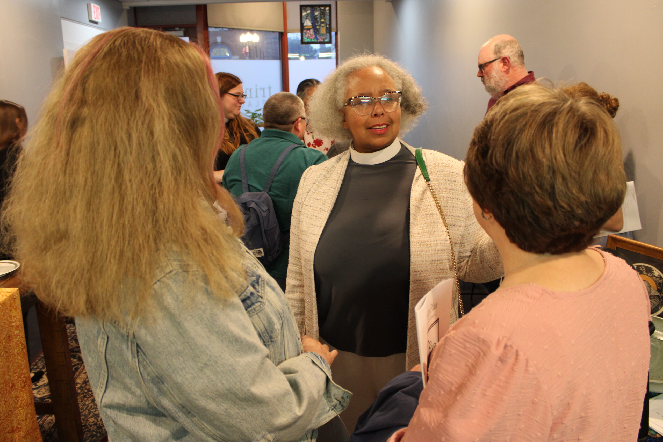 Hands Together in Prayer at Trinity Place